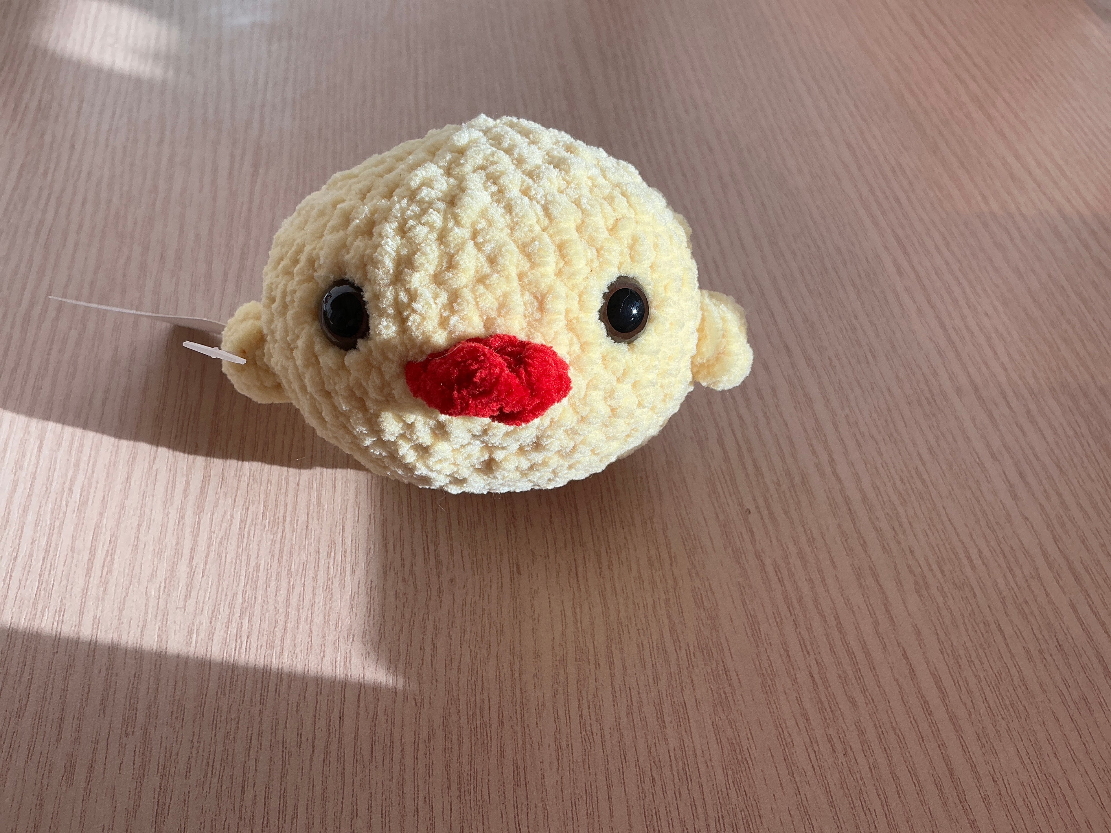 Peluche poussin